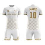 Custom soccer uniform in white and gold with geometric patterns for professional team kits.
