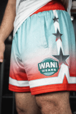 Close up of custom basketball uniform shorts showing fabric texture sublimation print and stitching quality