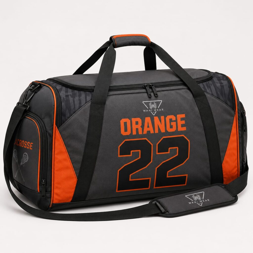 Custom lacrosse duffel bag with orange sublimated logo and lacrosse stick print