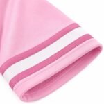Close-up of pink mesh football jersey hem showing contrast sleeve stripe trim