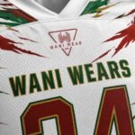 : Custom American football uniform by Wani Wears featuring a sublimated jersey, padded football pants, reinforced stitching, and breathable fabric