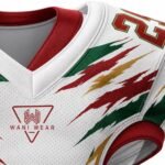 Close-up of a custom American football jersey showing breathable mesh fabric, reinforced shoulder stitching, sublimation printing, and Wani Wears logo