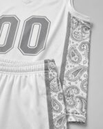 Close-up of paisley bandana print fabric and stitching detail on basketball uniform – Wani Wear