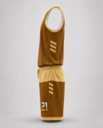 Side profile of custom sublimated basketball jersey and shorts showing mesh panel and stripe detail – Wani Wear