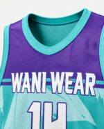 Custom teal purple basketball jersey collar and logo close-up