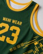 Custom basketball jersey green gold collar and number 23 close up