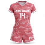 Front view of custom pink women’s volleyball uniform set