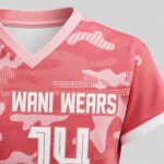 Custom pink camouflage women’s volleyball jersey close-up