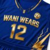 Royal blue and gold women's volleyball jersey and shorts set laid flat