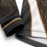 Women’s volleyball jersey sleeve and reinforced hem stitching close-up