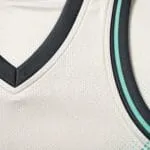 Custom basketball jersey V-neck stitching and breathable mesh fabric close-up