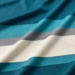 Breathable mesh fabric for a custom teal basketball jersey