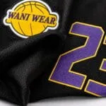 Custom V-neck basketball jersey fabric stitching and trim close-up