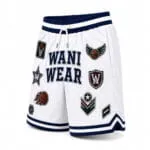 Custom white basketball shorts with embroidered patches and navy trim