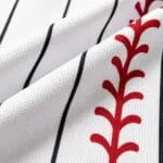 Breathable white pinstripe baseball jersey fabric close-up