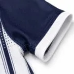 Custom baseball jersey sleeve trim and stitching close-up