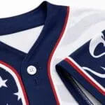 Custom baseball jersey collar, button and stitching close-up
