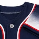 Custom navy baseball jersey collar, button and sleeve close-up