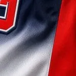 Navy white and red gradient baseball jersey fabric close-up