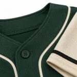 Custom green baseball jersey collar and button close-up