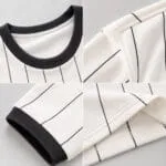 Custom pinstripe baseball jersey stitching details showing ribbed collar, sleeve cuff, shoulder seam and bottom hem