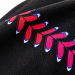 Sublimated baseball jersey fabric close-up showing breathable polyester texture