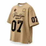Tan custom oversized baseball T-shirt jersey front view with Wani Wear branding, black number 07 and sleeve graphics