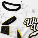 Custom baseball jersey fabric and stitching close-up with sublimated logo and ribbed collar