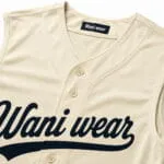 Premium fabric, buttons and custom neck label on sleeveless baseball jersey