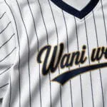 Breathable fabric and sublimated logo on custom baseball jersey