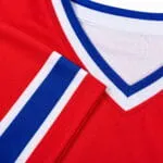 Reinforced stitching and striped V-neck collar on a baseball jersey