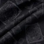 Breathable black sublimated fabric with tonal pattern