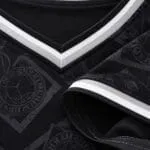 Striped V-neck collar and reinforced baseball jersey stitching