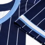 Navy breathable fabric with white baseball pinstripes