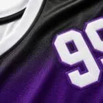 Applied number detail on purple basketball jersey