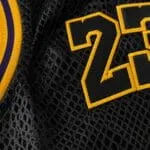 Stitched player number on custom mesh basketball jersey