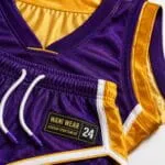 Close-up of personalized basketball uniform woven label