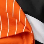 Premium fabric close-up of a custom baseball team hoodie