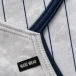 Reinforced stitching and branded label on custom baseball team hoodie
