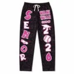 Custom sublimated baseball pants with pink and white graphics