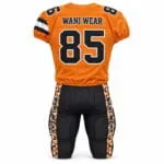 Back view of orange and black custom American football uniform