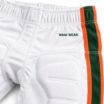 Padded football pants fabric and reinforced stitching close-up