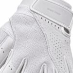 Close-up of white batting glove mesh back panel and debossed Wani Wear strap