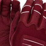 Close-up of padded batting gloves showing diamond-vented knuckle shield
