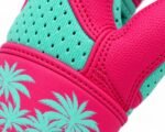Close-up of palm tree batting gloves showing printed cuff skyline and perforated panels
