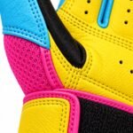 Detail of pink batting gloves perforated leather and contrast stitching