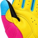 Close-up of pink batting gloves cut-and-sewn colour panels and mesh thumb gusset