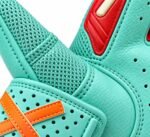 Close-up of softball batting gloves mesh gusset and orange cross cuff badge