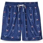 Customized lacrosse shorts front view in navy with all-over crossed sticks and mascot print
