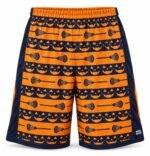 Customized lacrosse shorts front view with orange pumpkin and lacrosse stick pattern and navy side panels
